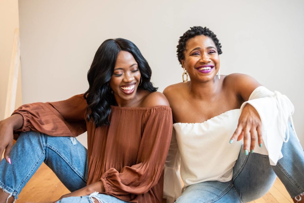 Two women sitting together