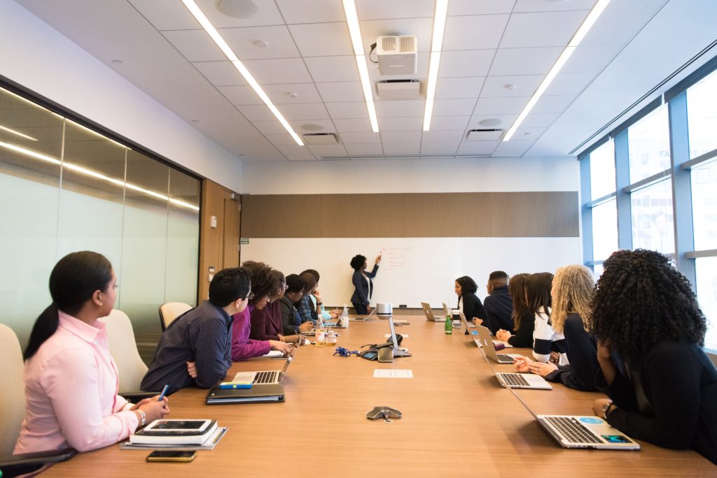 facilitation of professional gatherings, group together in conference room